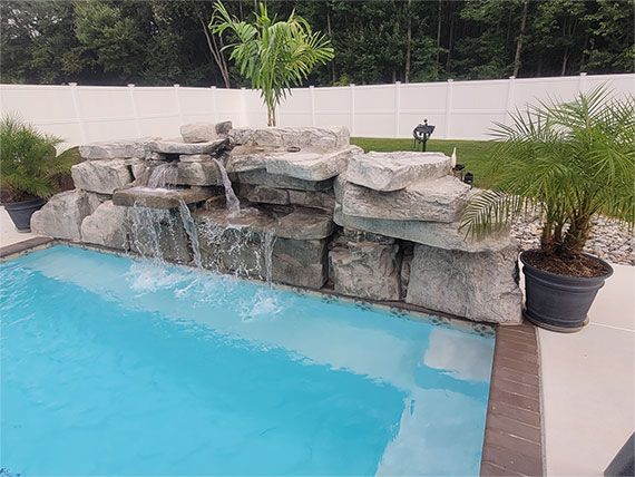 Looking for custom swimming pool features like a spa and waterfall? Leisure Contracting is the best at custom design. Call 410-242-2264.
