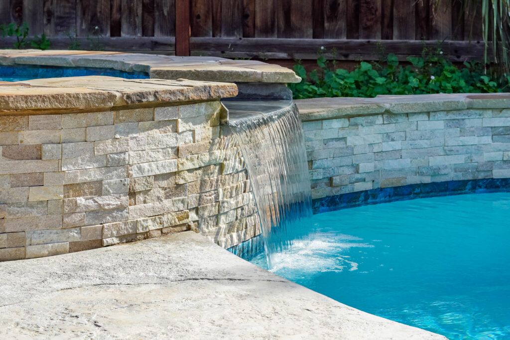 Custom Pool Features That Turn Your Backyard into a Resort